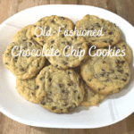 Chocolate chip cookies on a white platter.
