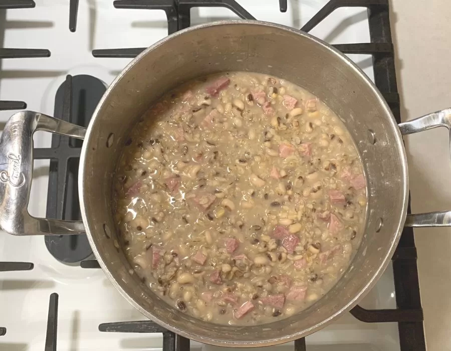 Hoppin John's in a large pot on the stove.