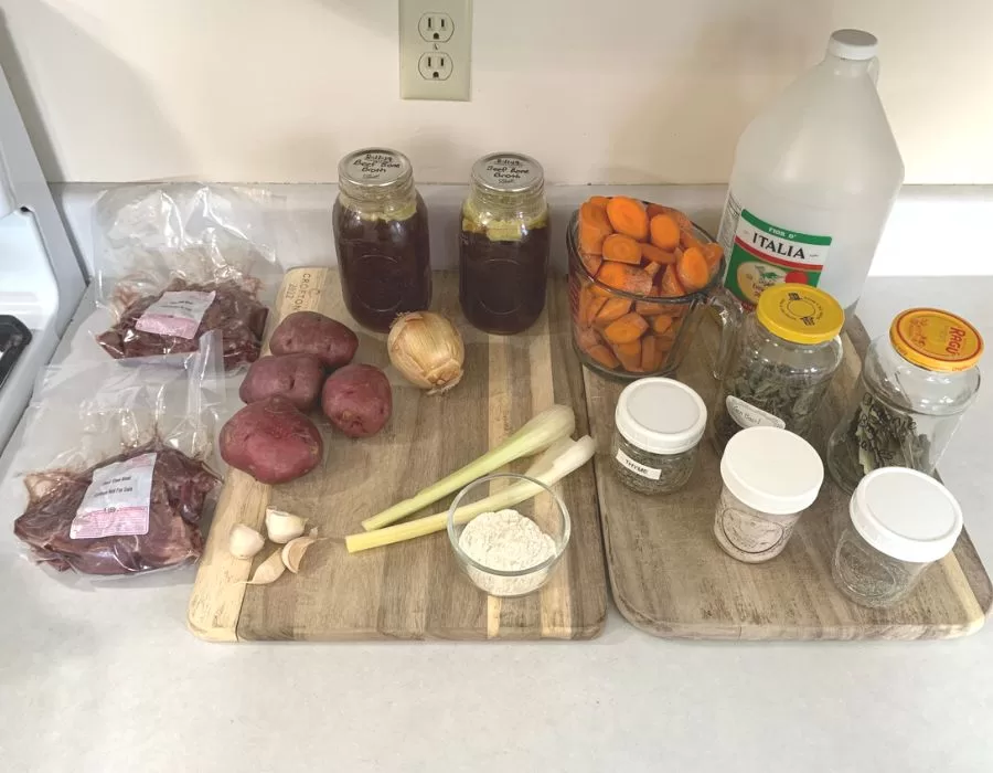 Beef stew ingredients on the counter.