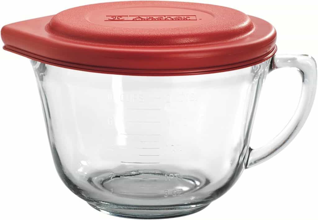 Anchor Hocking 8-cup glass measuring cup with red lid.