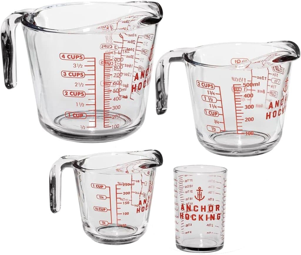 Set of three glass liquid measuring cups.