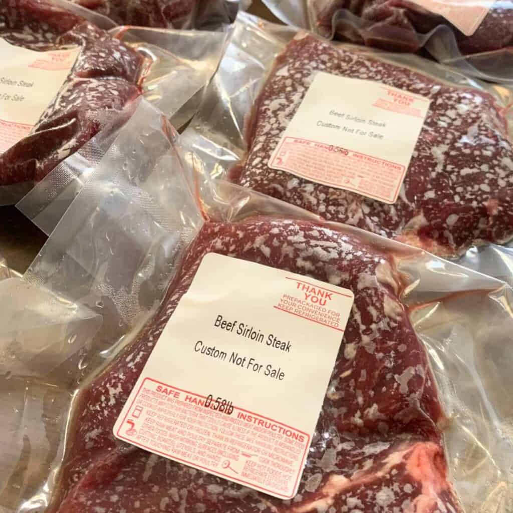 Packages of beef sirloin steak.