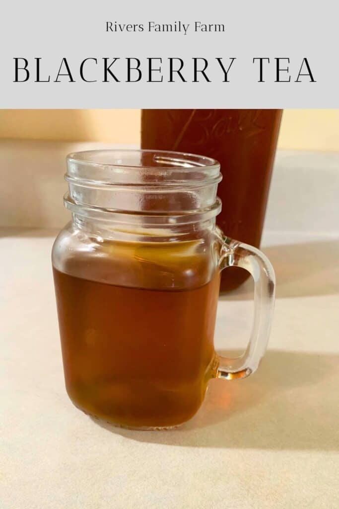 A glass mason jar of organic blackberry tea sitting on a kitchen counter in front of a half-gallon mason jar of blackberry tea. The title is "Blackberry Tea" by Rivers Family Farm.